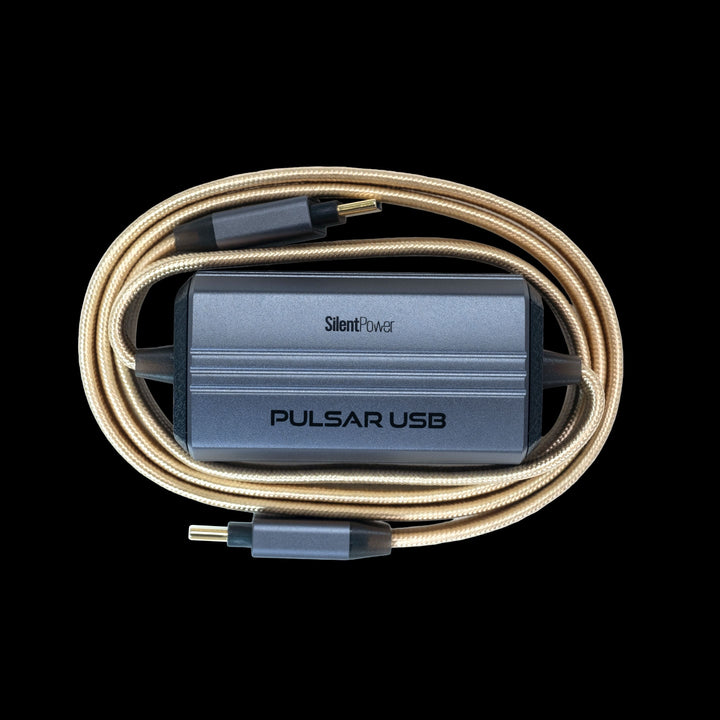 Pulsar USB power adapter with coiled cable on a black background